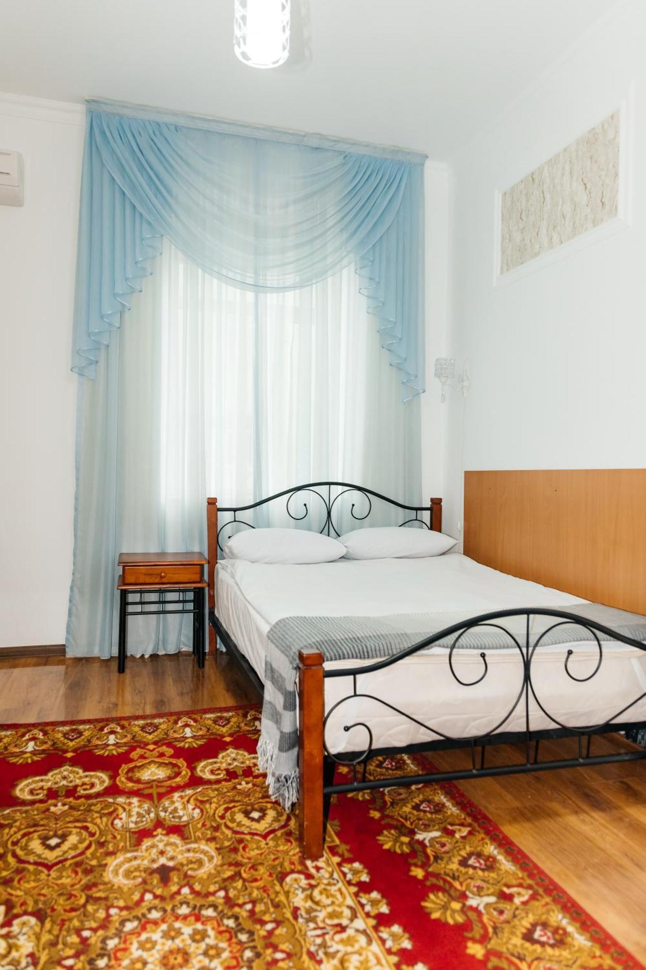 Hotel ВаYan Шимкент Екстер'єр фото